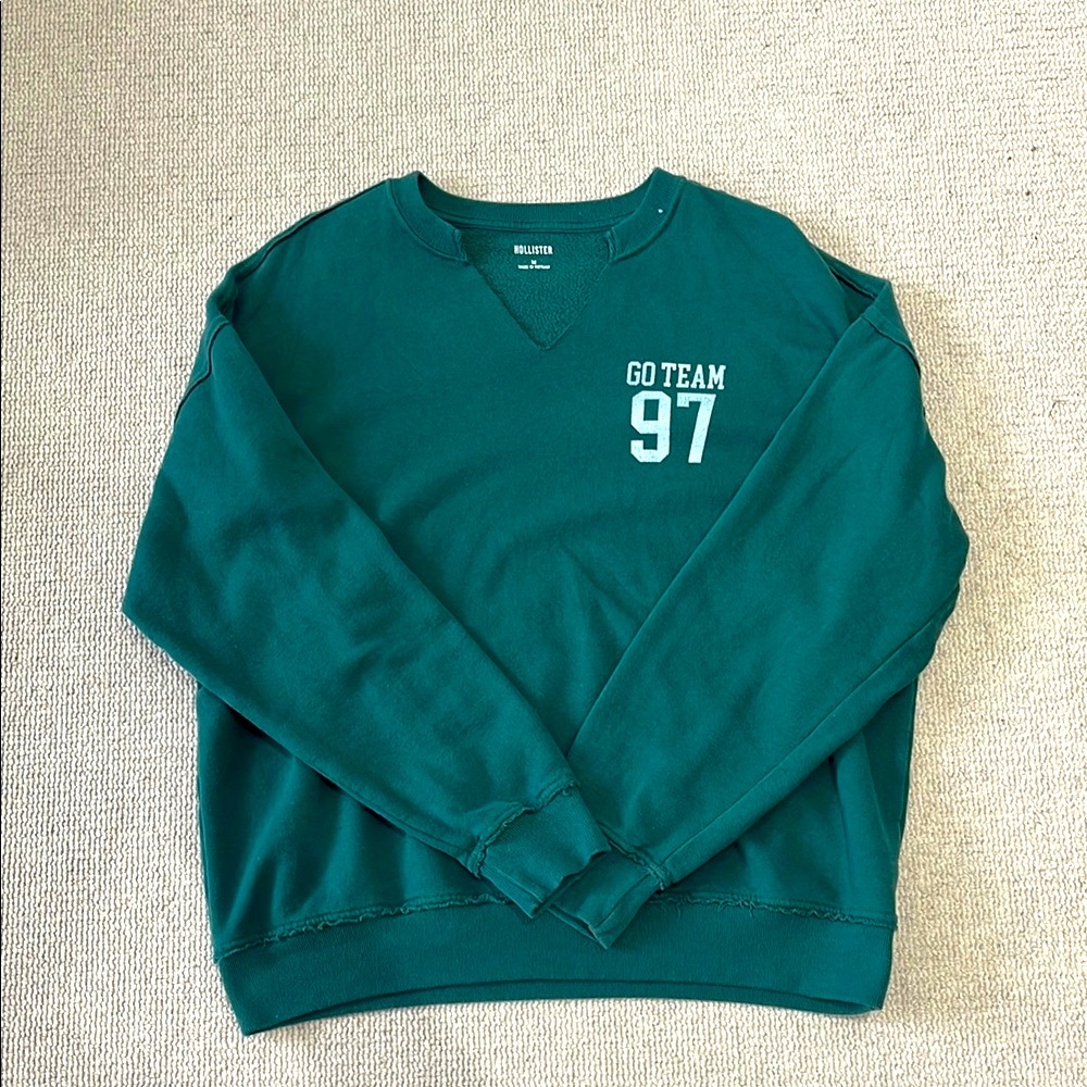 HOLLISTER Oversized notch-neck “GO TEAM” graphic sweatshirt